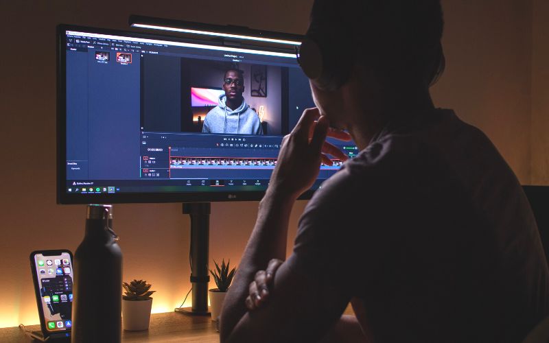 man editing a video to become a content creator